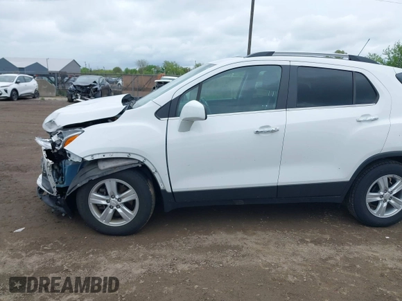 2020 Chevrolet Trax LT with VIN 3GNCJLSB9LL143621, listed as a IAAI auction lot 42253775 with 63,822 mi miles and . Bid and sale history available at DreamBid. Image 14.
