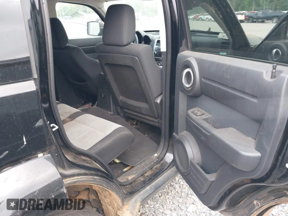 2007 Dodge Nitro SXT z VIN 1D8GU28K97W727361, wystawiony jako IAAI lot #42142970 z przebiegiem 144 579 mil mil oraz . Historia ofert i sprzedaży dostępna na DreamBid. Obrazek 8.
