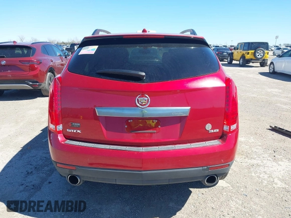 2014 Cadillac SRX with VIN 3GYFNAE36ES597007, listed as a IAAI auction lot 41675527 with 105,613 mi miles and . Bid and sale history available at DreamBid. Image 16.