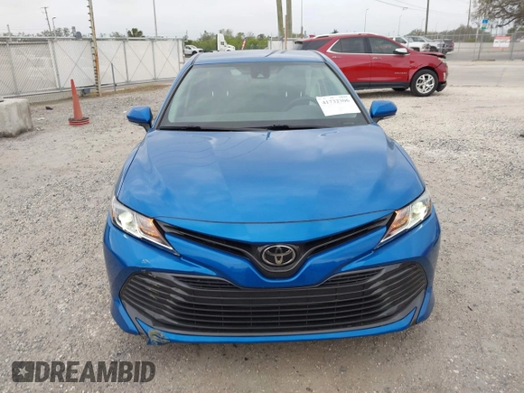 2020 Toyota Camry LE with VIN 4T1L11AK5LU310671, listed as a IAAI auction lot 41732306 with 61,379 mi miles and . Bid and sale history available at carsss.com. Image 13.