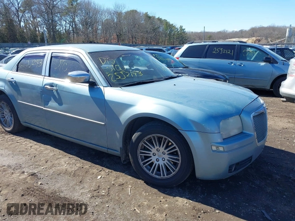 2009 Chrysler 300 LX with VIN 2C3KA43D19H552759, listed as a IAAI auction lot 41702989 with 172,572 mi miles. Bid and sale history available at carsss.com. Image 1.