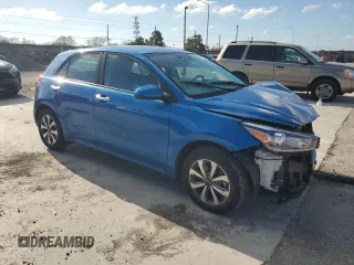2023 Kia Rio S with VIN 3KPA25AD9PE548173, listed as a Copart auction lot 50232915 with 26,668 mi miles and Salvage Title. Bid and sale history available at DreamBid. Image 4.