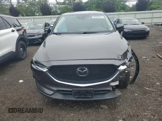 2018 Mazda CX-5 Grand Touring с VIN JM3KFBDM8J0424633, выставлен на аукционе Copart как лот 59888035 с пробегом 77 721 миль миль и Списание • Salvage title. История ставок и продаж доступна на DreamBid. Изображение 5.