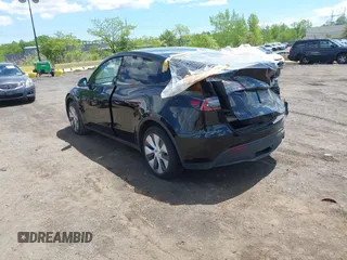 2023 Tesla Model Y Long Range with VIN 7SAYGDEE0PA183891, listed as a IAAI auction lot 42205573 with 41,273 mi miles and . Bid and sale history available at DreamBid. Image 3.