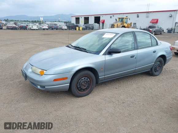 2002 Saturn SL z VIN 1G8ZS52842Z289815, wystawiony jako IAAI lot #42557607 z przebiegiem 184 671 mil mil oraz . Historia ofert i sprzedaży dostępna na DreamBid. Obrazek 2.