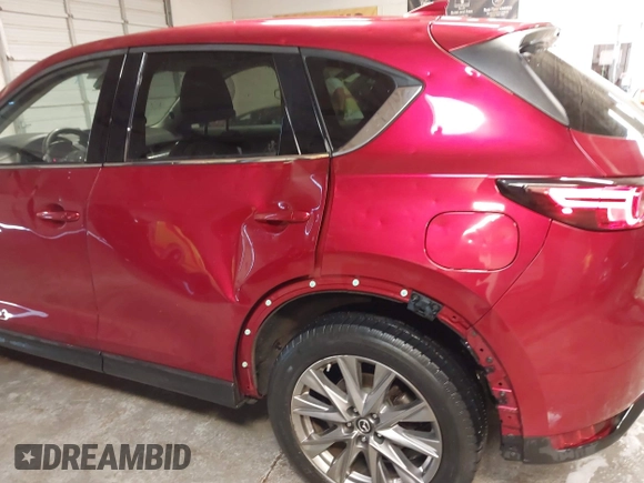 2020 Mazda CX-5 Grand Touring with VIN JM3KFBDM1L1809951, listed as a IAAI auction lot 41345854 with 117,376 mi miles. Bid and sale history available at carsss.com. Image 6.
