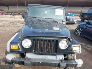 2006 Jeep Wrangler Sport z VIN 1J4FA49S06P721223, wystawiony jako IAAI lot #42654272 z przebiegiem 225 223 mil mil oraz . Historia ofert i sprzedaży dostępna na DreamBid. Obrazek 12.
