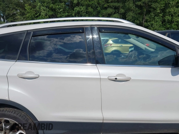 2015 Ford Escape Titanium with VIN 1FMCU9J90FUA05005, listed as a IAAI auction lot 42501764 with 121,993 mi miles and . Bid and sale history available at DreamBid. Image 13.