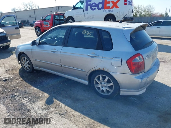 2006 Kia Spectra with VIN KNAFE161265317272, listed as a IAAI auction lot 42008875 with 169,983 mi miles. Bid and sale history available at carsss.com. Image 3.