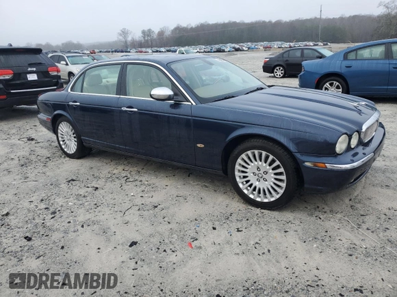 2007 Jaguar XJ Vanden Plas with VIN SAJWA82B57SH14424, listed as a Copart auction lot 45091395 with 99,242 mi miles and Salvage Title. Bid and sale history available at carsss.com. Image 4.
