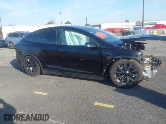 2023 Tesla Model X with VIN 7SAXCDE59PF430836, listed as a IAAI auction lot 41545267 with Not Provided miles and . Bid and sale history available at DreamBid. Image 12.