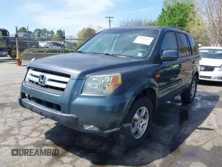 2006 Honda Pilot EX with VIN 2HKYF18416H529290, listed as a IAAI auction lot 41915915 with 135,385 mi miles and . Bid and sale history available at DreamBid. Image 17.