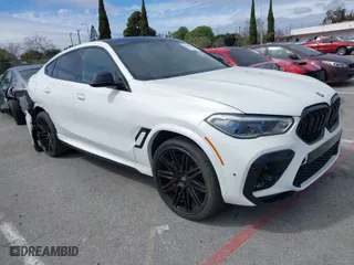 2022 BMW X6 M with VIN 5YMCY0C03N9J18331, listed as a IAAI auction lot 41815291 with NaN miles. Bid and sale history available at carsss.com. Image 1.
