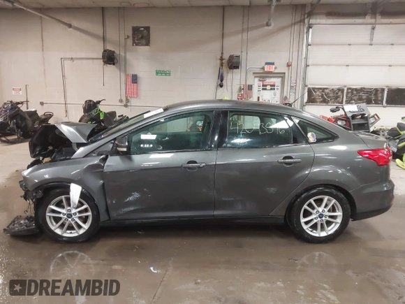 2016 Ford Focus SE with VIN 1FADP3F21GL247906, listed as a IAAI auction lot 42043546 with 124,532 mi miles and . Bid and sale history available at DreamBid. Image 14.