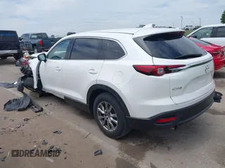 2018 Mazda CX-9 Touring с VIN JM3TCACY0J0214717, выставлен на аукционе IAAI как лот 42331827 с пробегом 116 470 миль миль и . История ставок и продаж доступна на DreamBid. Изображение 3.