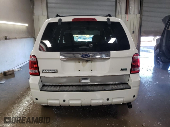 2012 Ford Escape Limited z VIN 1FMCU9EG3CKB88495, wystawiony jako Copart lot #80096324 z przebiegiem 382 892 mil mil oraz Szkoda całkowita • Salvage title. Historia ofert i sprzedaży dostępna na DreamBid. Obrazek 6.