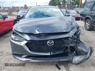 2025 Mazda 3 S Preferred with VIN 3MZBPACM8SM457113, listed as a IAAI auction lot 41938950 with 4,291 mi miles and . Bid and sale history available at DreamBid. Image 12.
