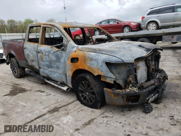 2016 Nissan Titan Platinum Reserve with VIN 1N6BA1F44GN508262, listed as a Copart auction lot 54571155 with Not provided miles and Non repairable. Bid and sale history available at DreamBid. Image 4.