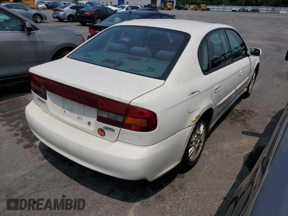 2004 Subaru Legacy Sedan (Natl) L with VIN 4S3BE625247210733, listed as a Copart auction lot 74218154 with 175,254 mi miles and Salvage Title. Bid and sale history available at carsss.com. Image 3.