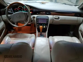 2004 Cadillac Seville Luxury SLS z VIN 1G6KS54Y24U168062, wystawiony jako Copart lot #84865574 z przebiegiem 240 052 mil mil oraz Tytuł czysty. Historia ofert i sprzedaży dostępna na DreamBid. Obrazek 8.