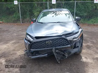2023 Toyota Corolla Cross L with VIN 7MUAAAAGXPV060044, listed as a IAAI auction lot 42289062 with 29,837 mi miles and . Bid and sale history available at DreamBid. Image 12.
