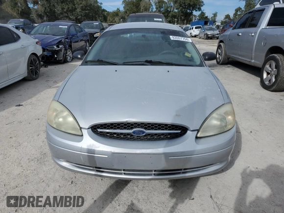2003 Ford Taurus LX Standard z VIN 1FAFP52U43A110444, wystawiony jako Copart lot #83557764 z przebiegiem 118 897 mil mil oraz Szkoda całkowita • Salvage title. Historia ofert i sprzedaży dostępna na DreamBid. Obrazek 5.