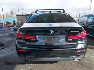 2021 BMW 5 Series 530e with VIN WBA13AG07MCF87003, listed as a IAAI auction lot 41550152 with 52,214 mi miles and . Bid and sale history available at carsss.com. Image 16.