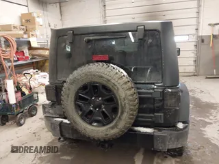 2016 Jeep Wrangler Unlimited Sport with VIN 1C4BJWDG9GL114359, listed as a IAAI auction lot 41422535 with 133,462 mi miles and . Bid and sale history available at DreamBid. Image 17.