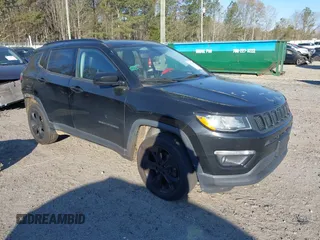 2019 Jeep Compass Latitude with VIN 3C4NJDBB1KT661261, listed as a IAAI auction lot 41883403 with 207,304 mi miles and . Bid and sale history available at DreamBid. Image 1.