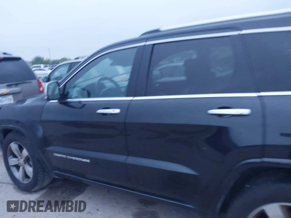 2015 Jeep Grand Cherokee High Altitude with VIN 1C4RJECG1FC654247, listed as a IAAI auction lot 41897014 with 204,630 mi miles. Bid and sale history available at carsss.com. Image 14.