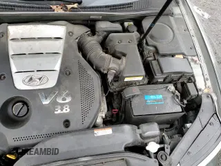 2006 Hyundai Azera SE с VIN KMHFC46F86A052821, выставлен на аукционе Copart как лот 86526614 с пробегом 160 968 миль миль и Списание • Salvage title. История ставок и продаж доступна на DreamBid. Изображение 13.