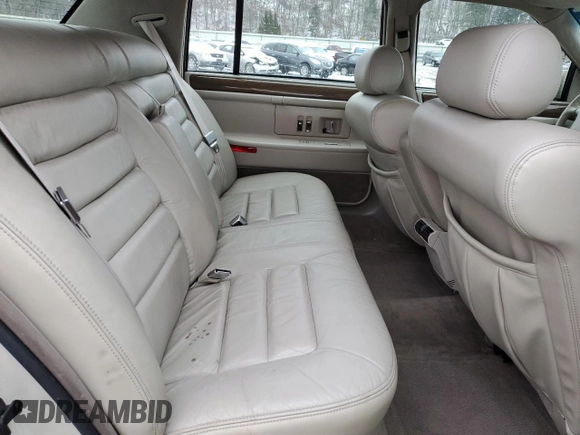 1995 Cadillac DeVille z VIN 1G6KD52B8SU274053, wystawiony jako Copart lot #86429934 z przebiegiem 100 496 mil mil oraz Szkoda całkowita • Salvage title. Historia ofert i sprzedaży dostępna na DreamBid. Obrazek 10.