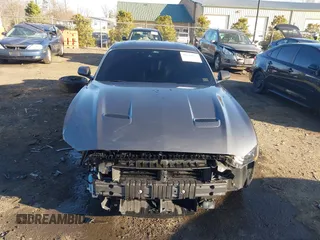 2021 Ford Mustang GT z VIN 1FA6P8CF9M5117126, wystawiony jako IAAI lot #41647619 z przebiegiem 31 076 mil mil oraz . Historia ofert i sprzedaży dostępna na DreamBid. Obrazek 13.