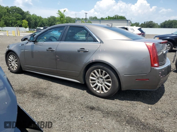 2012 Cadillac CTS Luxury with VIN 1G6DE5E54C0138040, listed as a Copart auction lot 61997305 with 140,996 mi miles and Salvage title. Bid and sale history available at DreamBid. Image 2.