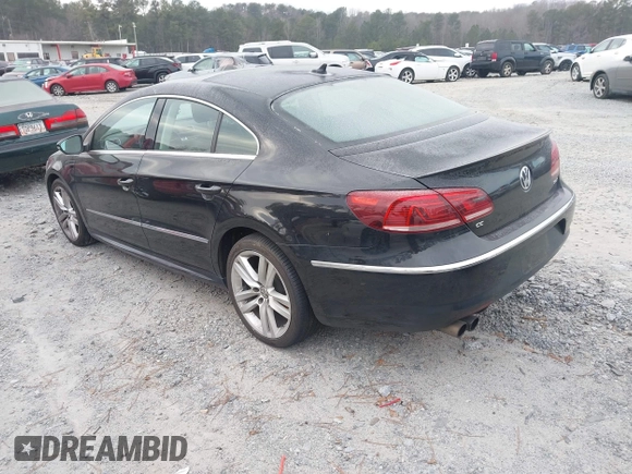 2014 Volkswagen CC Lux with VIN WVWRP7AN3EE537770, listed as a IAAI auction lot 41385247 with 135,069 mi miles. Bid and sale history available at carsss.com. Image 3.