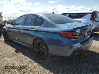 2023 BMW 5 Series M550i xDrive with VIN WBA13BK08PCN51125, listed as a Copart auction lot 76781294 with 8,855 mi miles and Non repairable. Bid and sale history available at DreamBid. Image 2.