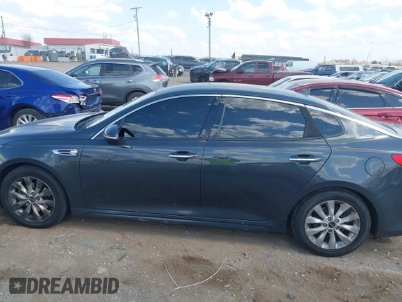 2016 Kia Optima EX with VIN 5XXGU4L30GG014019, listed as a IAAI auction lot 41786540 with 112,894 mi miles and . Bid and sale history available at carsss.com. Image 14.