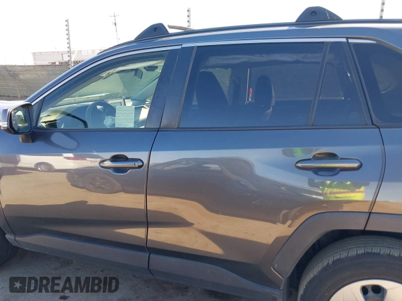 2019 Toyota RAV4 LE with VIN JTMG1RFV3KD025974, listed as a IAAI auction lot 41879264 with 131,933 mi miles and . Bid and sale history available at DreamBid. Image 14.