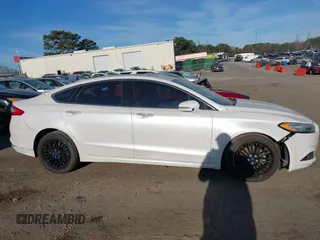 2014 Ford Fusion SE with VIN 3FA6P0HD5ER386781, listed as a IAAI auction lot 41814103 with 62,142 mi miles. Bid and sale history available at carsss.com. Image 14.