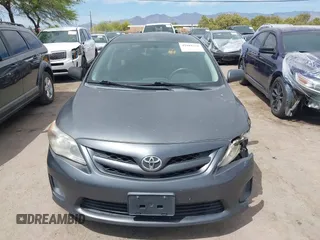 2011 Toyota Corolla L with VIN 2T1BU4EEXBC559590, listed as a IAAI auction lot 42101256 with 163,307 mi miles and . Bid and sale history available at DreamBid. Image 12.