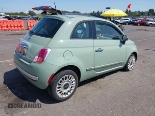 2013 FIAT 500 Lounge with VIN 3C3CFFCR5DT739516, listed as a IAAI auction lot 42439476 with 62,919 mi miles and . Bid and sale history available at DreamBid. Image 4.