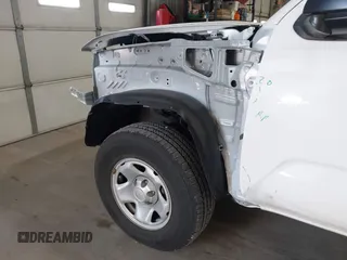 2023 Toyota Tacoma SR with VIN 3TYRX5GN7PT087621, listed as a IAAI auction lot 41969368 with 17,580 mi miles and . Bid and sale history available at DreamBid. Image 21.