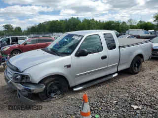 2004 Ford F-150 XL with VIN 2FTRX17W14CA29492, listed as a Copart auction lot 56910235 with Not provided miles and Salvage title. Bid and sale history available at DreamBid. Image 1.