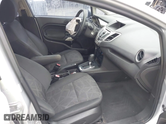 2013 Ford Fiesta SE with VIN 3FADP4EJ6DM107293, listed as a IAAI auction lot 41898229 with 129,694 mi miles. Bid and sale history available at carsss.com. Image 5.