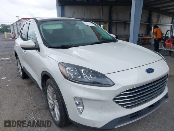 2021 Ford Escape Titanium with VIN 1FMCU9J93MUA36648, listed as a IAAI auction lot 42055229 with 122,864 mi miles and . Bid and sale history available at carsss.com. Image 1.