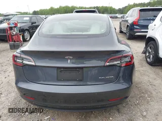 2022 Tesla Model 3 Long Range z VIN 5YJ3E1EB8NF315359, wystawiony jako IAAI lot #42035599 z przebiegiem 54 974 mil mil oraz . Historia ofert i sprzedaży dostępna na DreamBid. Obrazek 16.