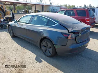 2018 Tesla Model 3 Long Range Battery with VIN 5YJ3E1EA1JF021139, listed as a IAAI auction lot 42116626 with 83,003 mi miles and . Bid and sale history available at DreamBid. Image 3.