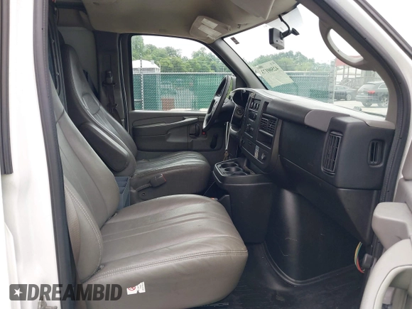 2013 Chevrolet Express Cargo with VIN 1GCSGAFX4D1158758, listed as a IAAI auction lot 42500173 with 235,408 mi miles and . Bid and sale history available at DreamBid. Image 5.
