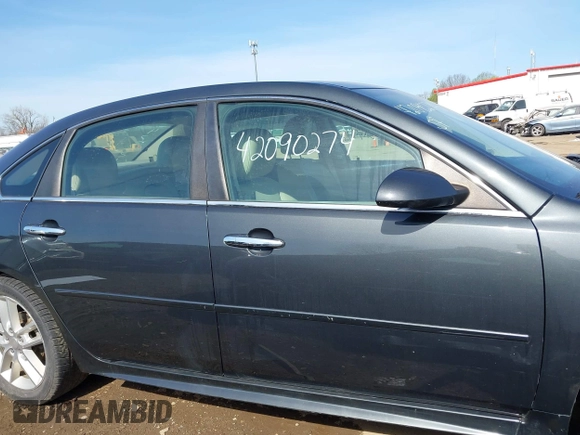 2015 Chevrolet Impala LTZ with VIN 2G1WC5E35F1142321, listed as a IAAI auction lot 42090274 with 109,972 mi miles and . Bid and sale history available at DreamBid. Image 13.