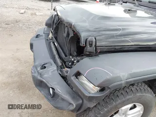 2018 Jeep Wrangler Unlimited Sport с VIN 1C4HJXDGXJW189576, выставлен на аукционе IAAI как лот 41906106 с пробегом 60 463 миль миль и . История ставок и продаж доступна на DreamBid. Изображение 18.